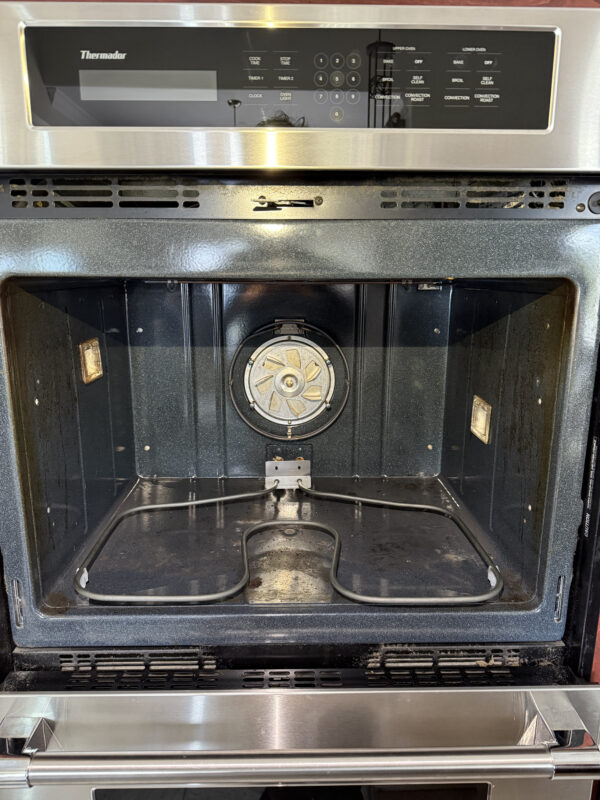 Had to remove the convection fan cover and door to safely disconnect the wires from the old heater and remove it without damaging the casing.