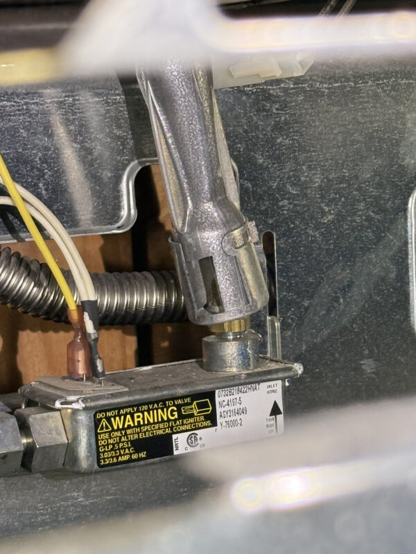 The large tube is inserted into the gas valve.