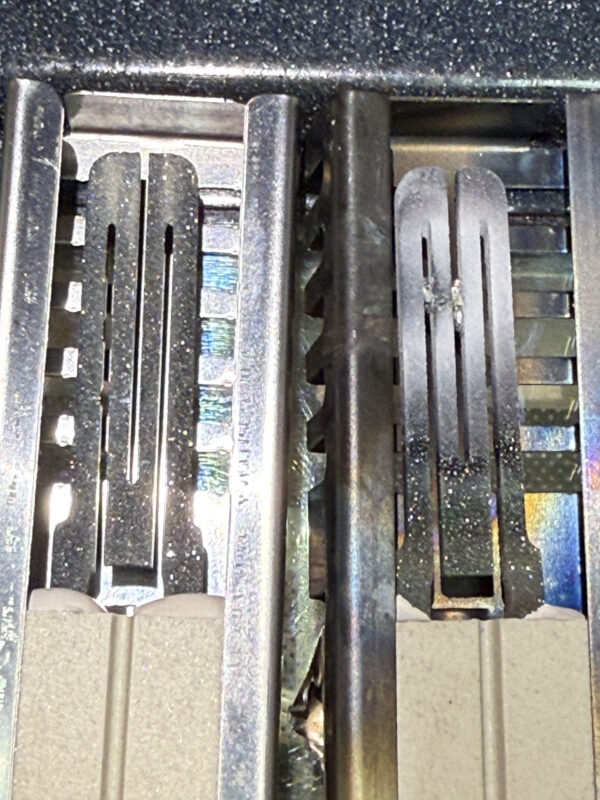Comparison: new igniter on the left, old igniter on the right—noticeable damage on the old one.