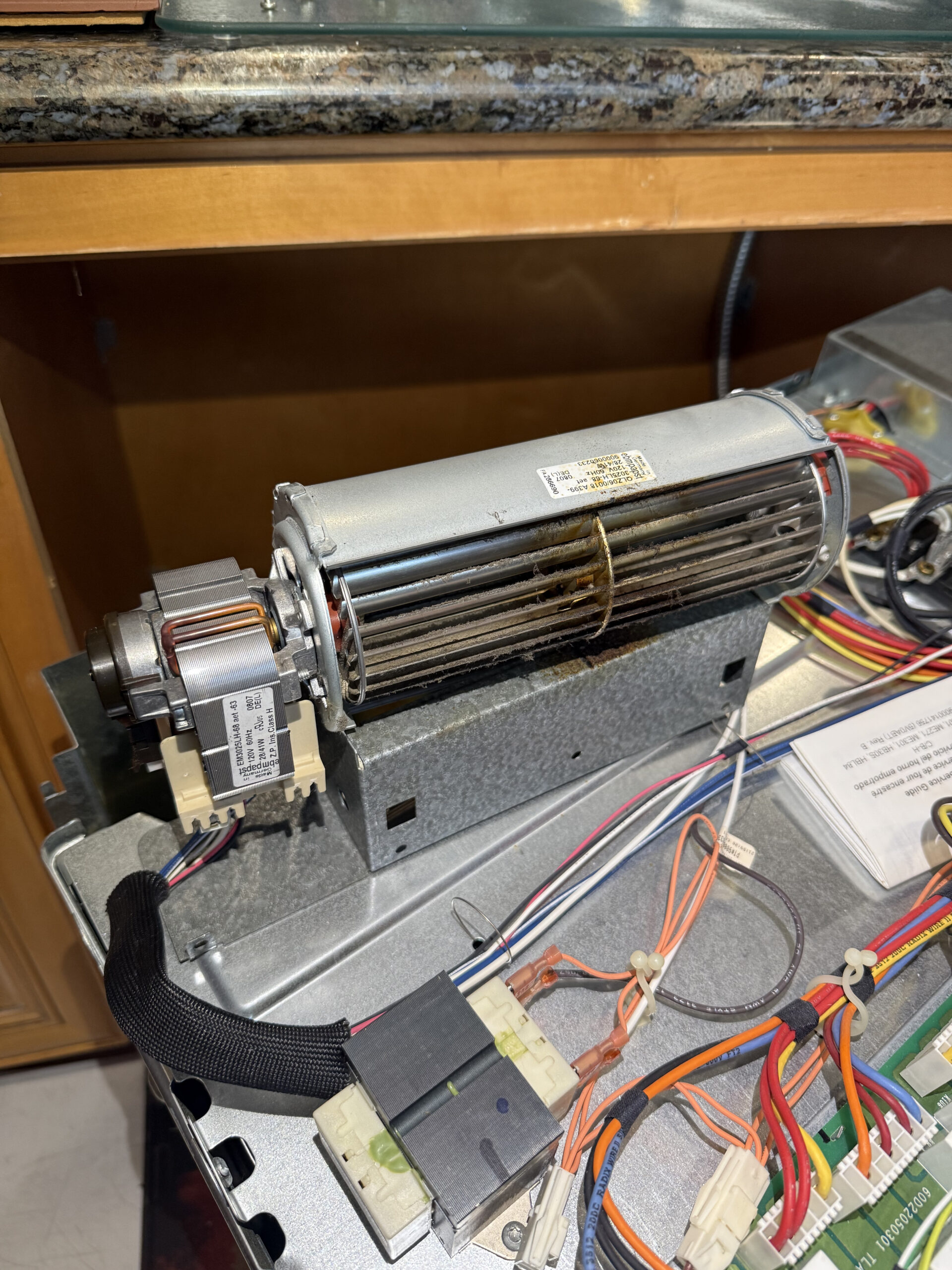 The blower has been removed from the housing.