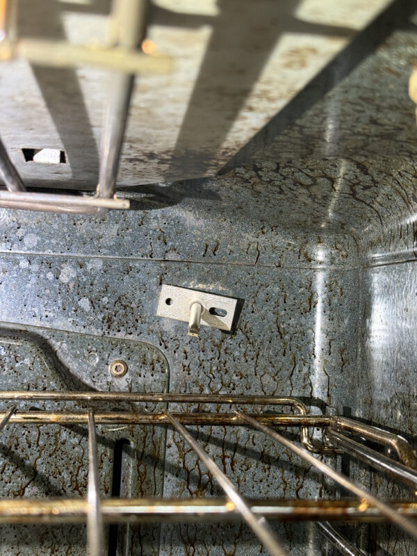 Carefully insert the sensor back in place.