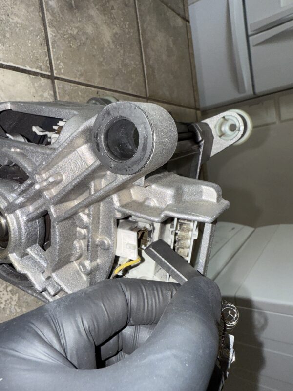 Be sure to pay attention to how the brushes are inserted. Take note of which side faces outward, as they are angled.