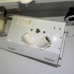 Trim panel removed, thermostat accessible