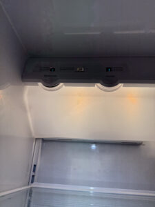 Refrigerator after repair, panel reinstalled, temperature display back to normal